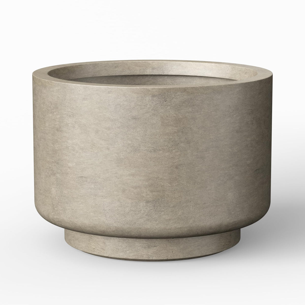 Kante front view of weathered concrete planter showing modern silhouette and durability