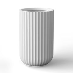 Kante front view of white concrete planter showing sleek column shape and modern look