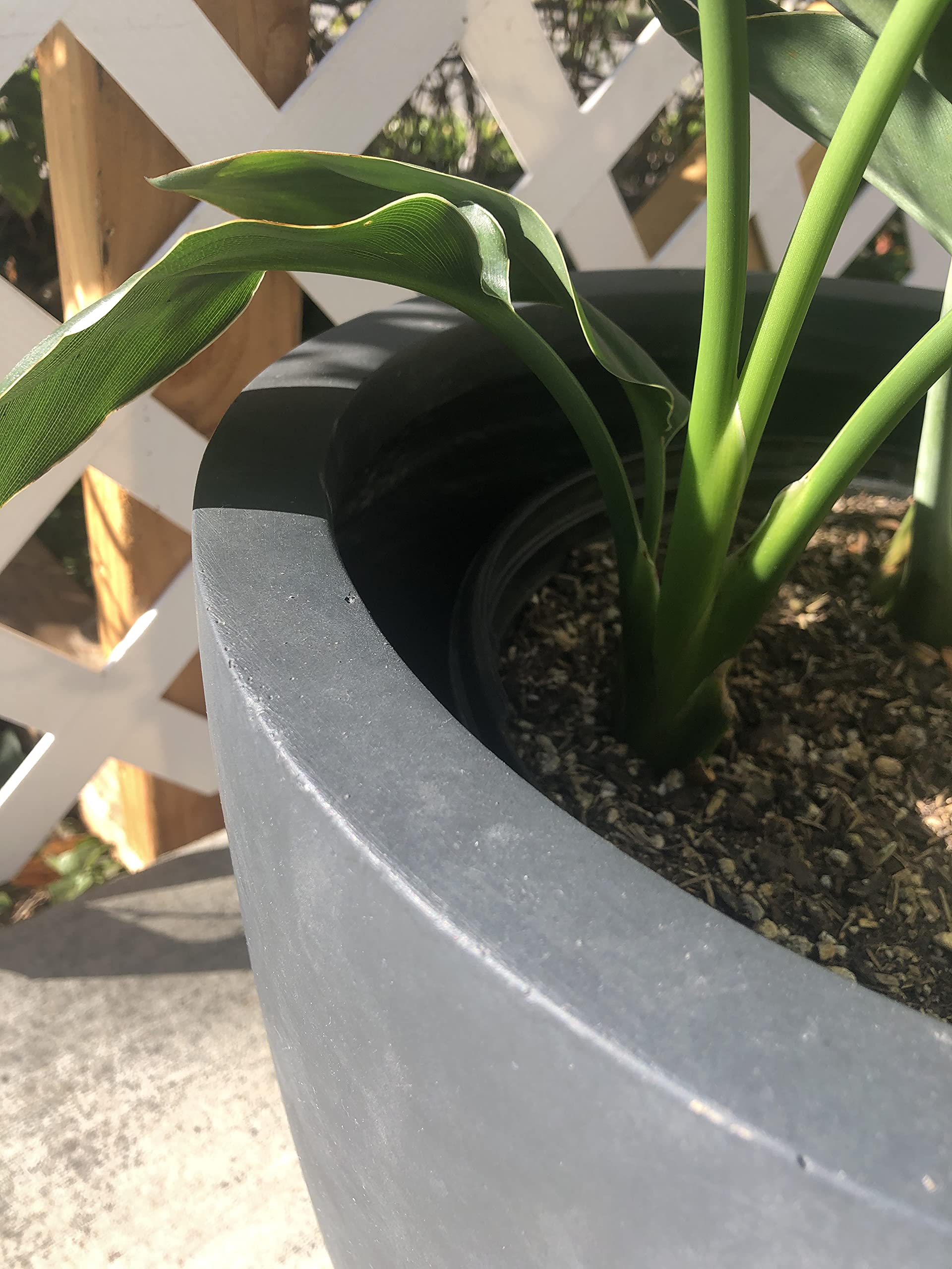Kante planter in use on patio with foliage showing outdoor styling benefit