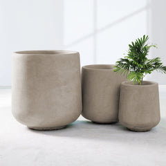 Kante large planter holding outdoor shrub demonstrating durability