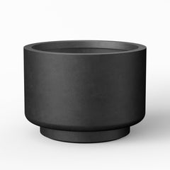 Kante front view of black pedestal planter showing modern silhouette and curb appeal