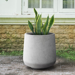 Kante planter drain plug detail demonstrating indoor-outdoor water control
