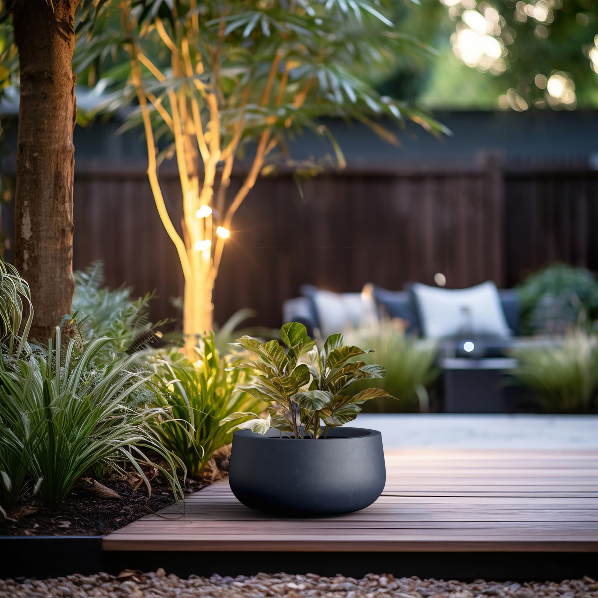 Kante planter drainage detail showing removable rubber plug for indoor-outdoor use