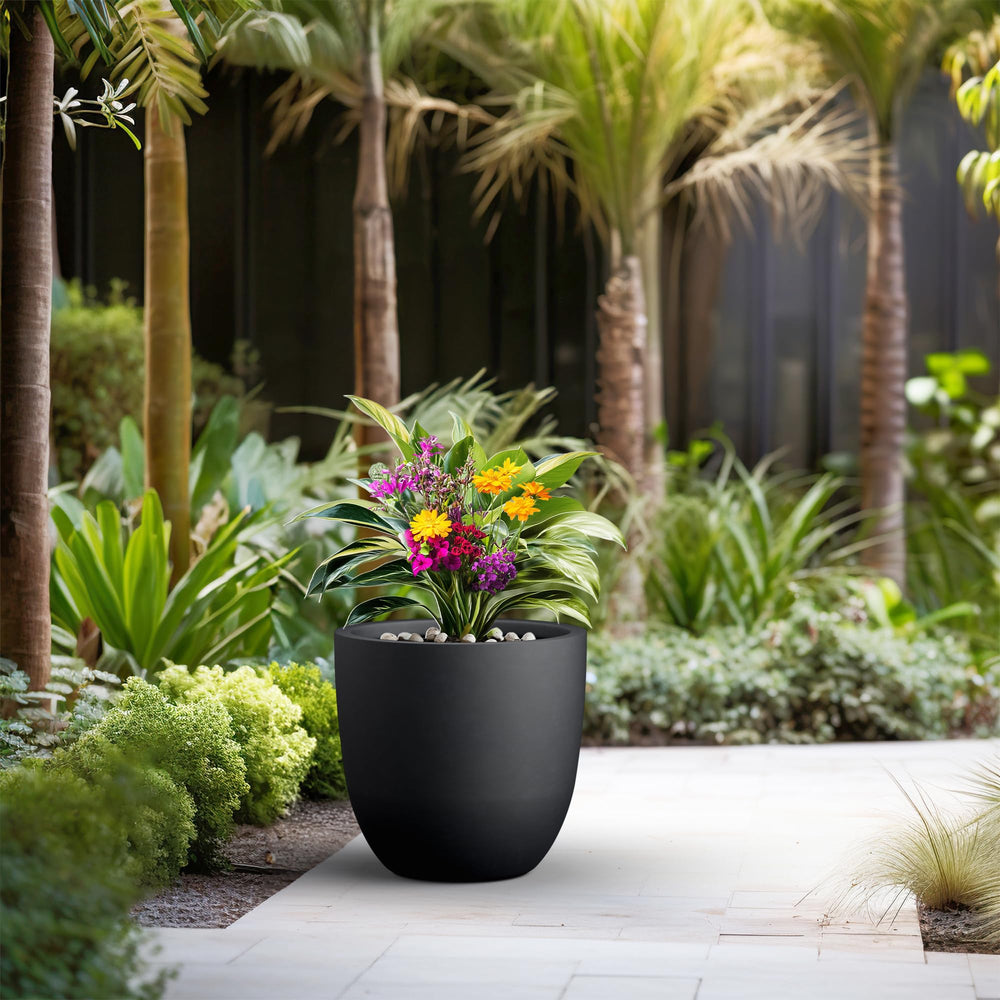Kante planter drainage hole with rubber plug showing flexible indoor-outdoor water control