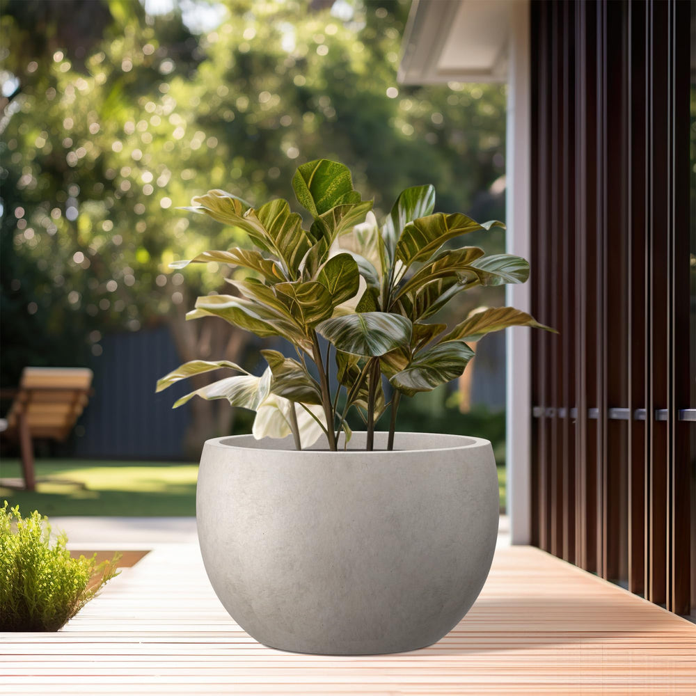 Kante planter drainage plug detail showing removable rubber plug for indoor flexibility