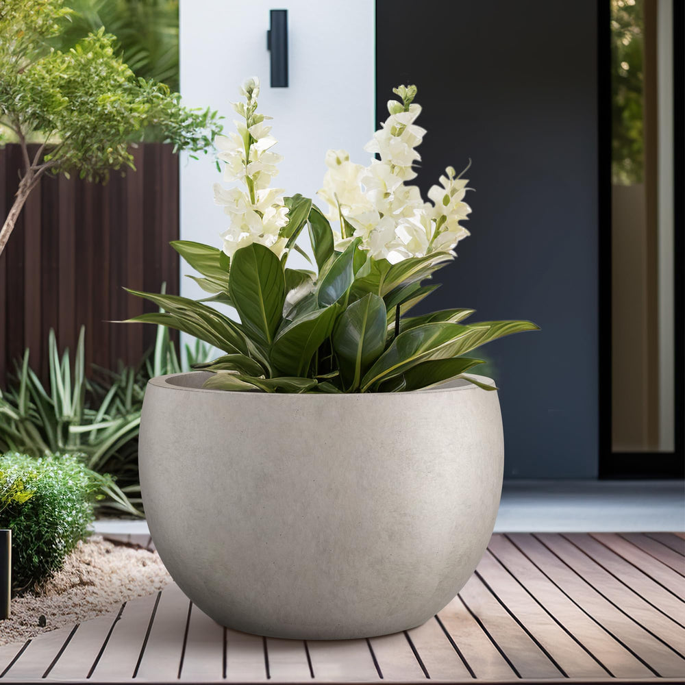 Kante planter on patio lifestyle shot highlighting lightweight handling and outdoor style