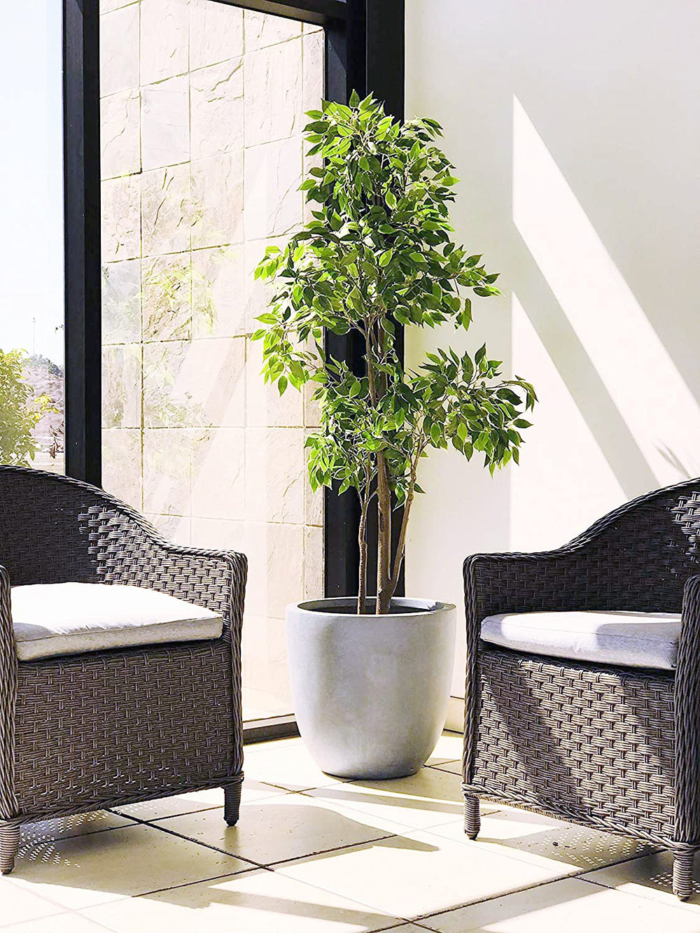 Kante planter on patio conveying durability and an all-weather outdoor benefit