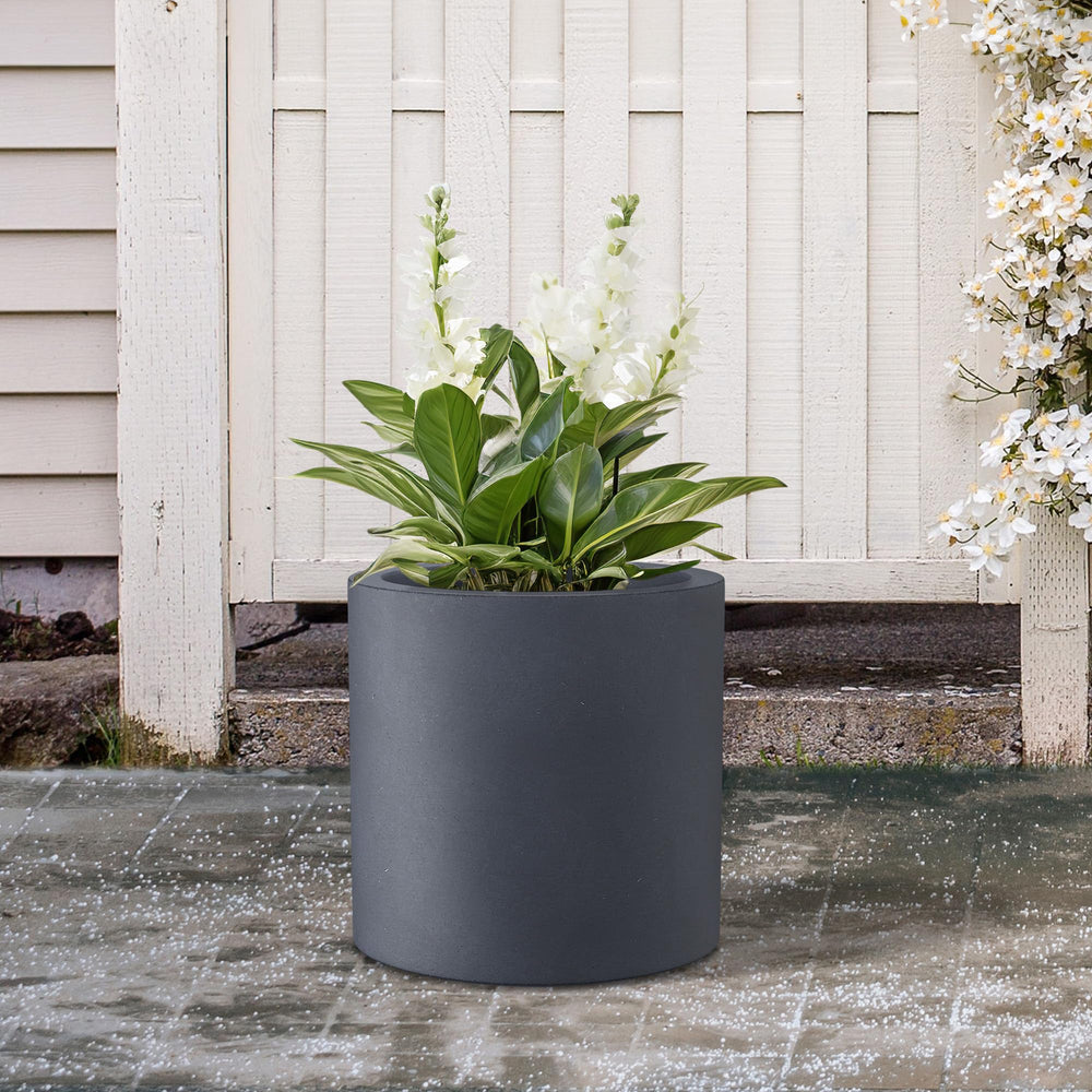 Kante planter beside chair showing scale and lightweight portability benefit