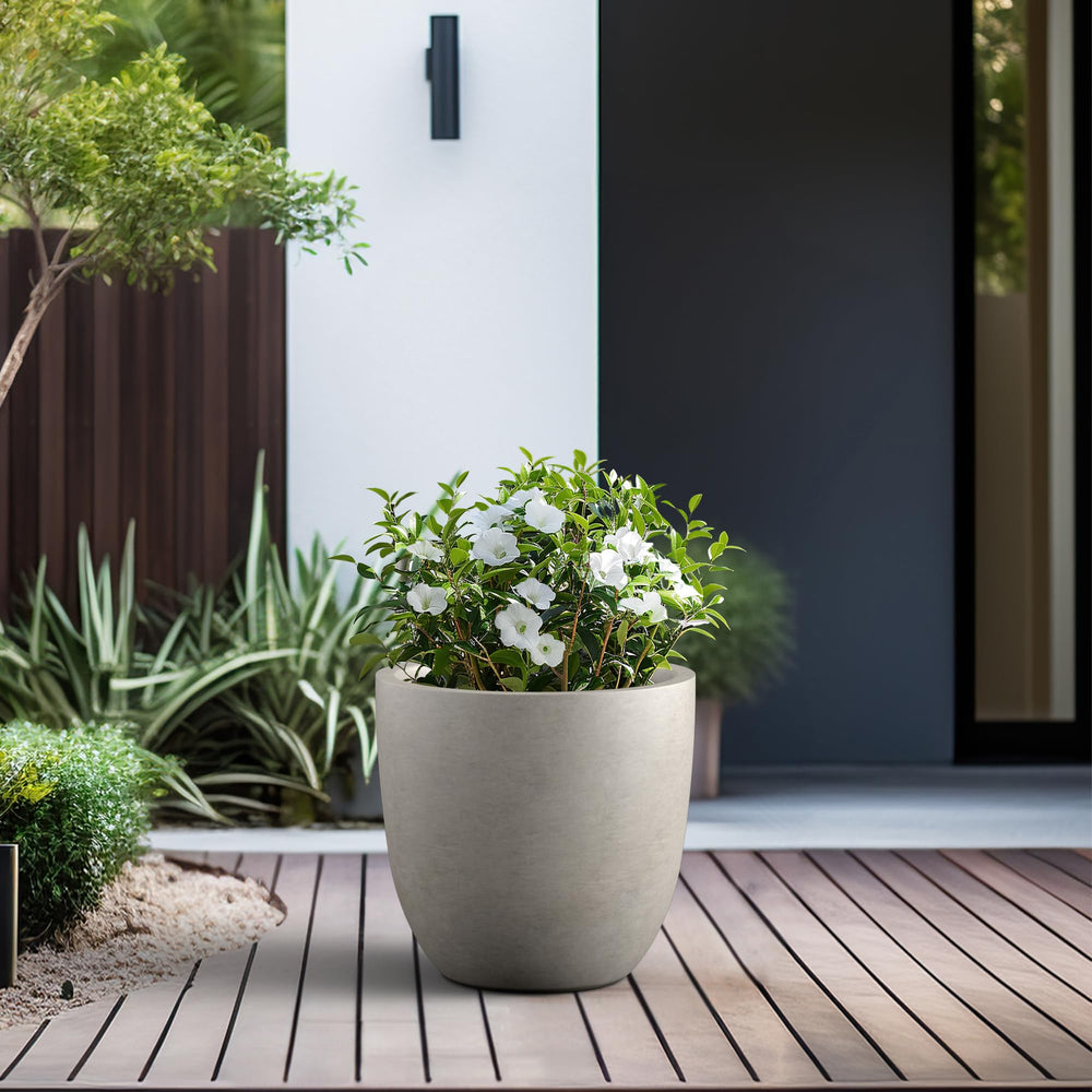 Kante planter on patio next to chair showing size and scale benefit
