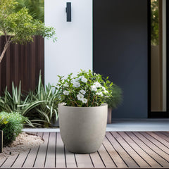 Kante planter on patio next to chair showing size and scale benefit