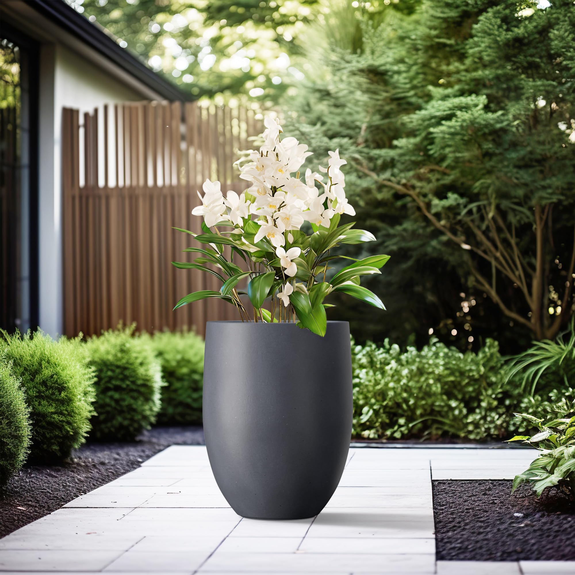 Kante planter beside measuring tape showing 21.7 inch scale