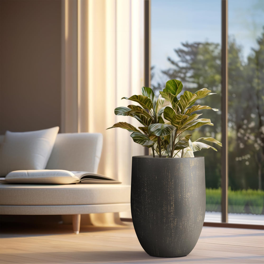 Kante planter in patio setting with plant demonstrating stylish outdoor use