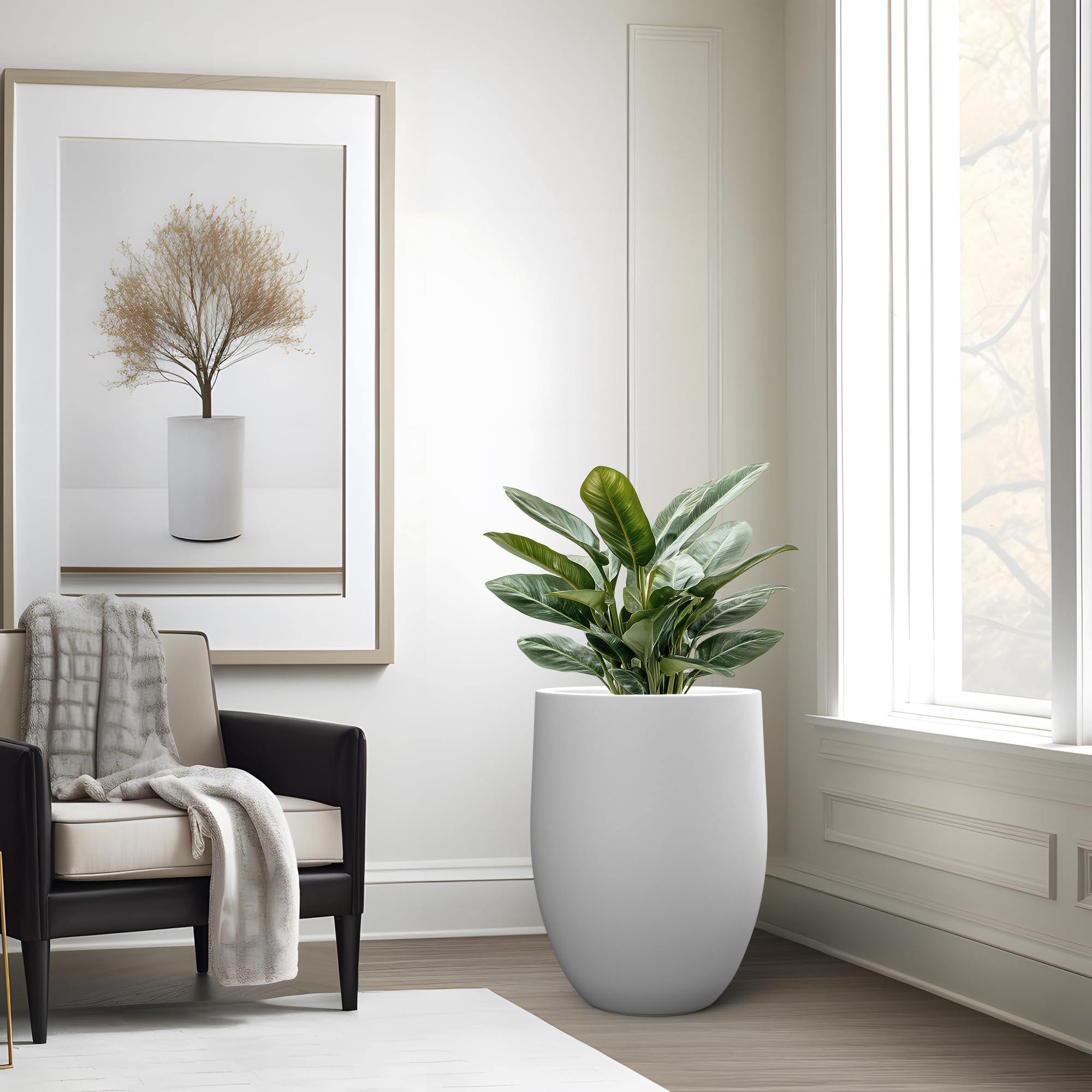 Kante planter holding an olive tree on patio to show weatherproof outdoor use