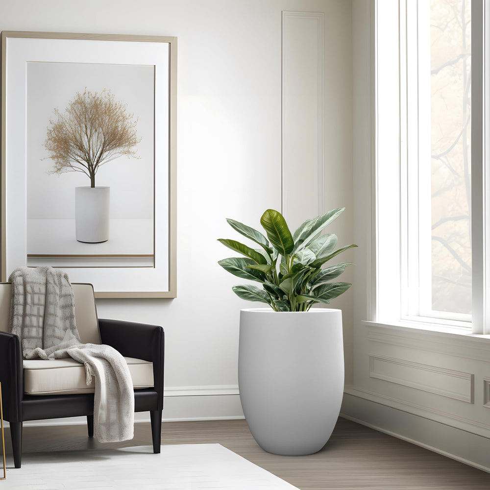 Kante planter holding an olive tree on patio to show weatherproof outdoor use