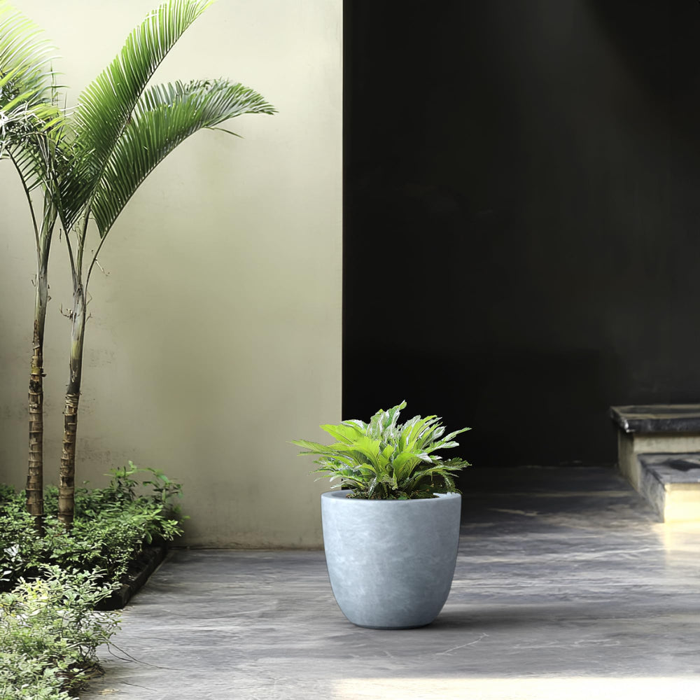 Kante planter front view showing slate gray finish and modern silhouette, enhances décor