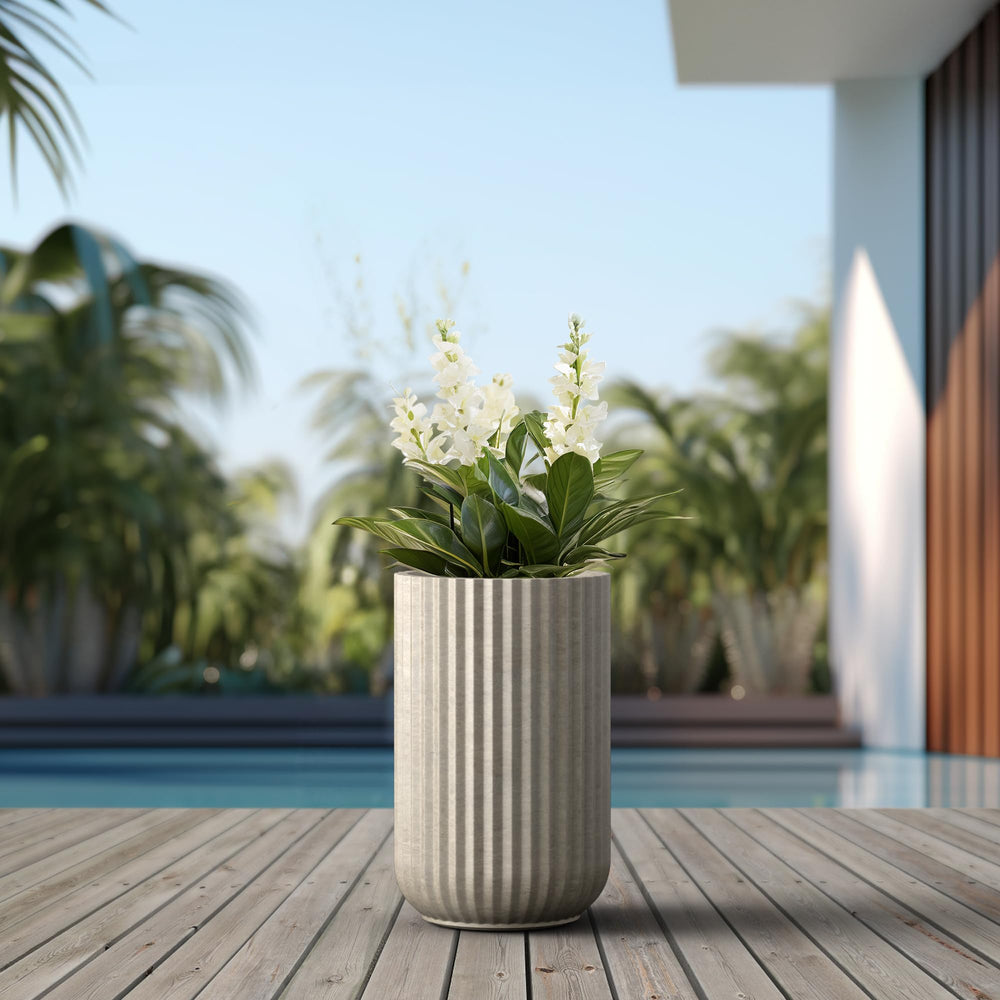 Kante planter beside chair for scale showing manageable lightweight design