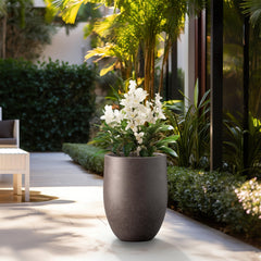 Kante side profile beside chair showing 21.7 inch height and easy portability
