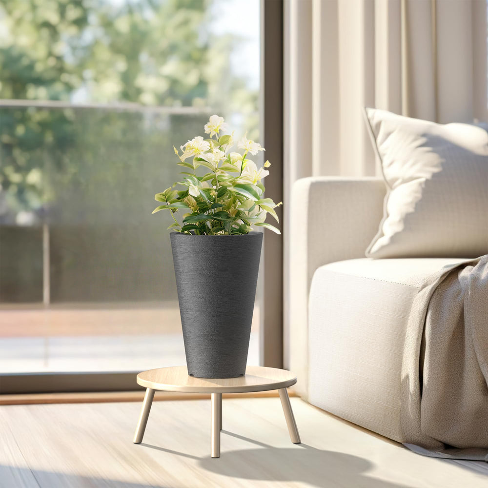 Kante planter next to chair for scale showing 15-inch height and presence