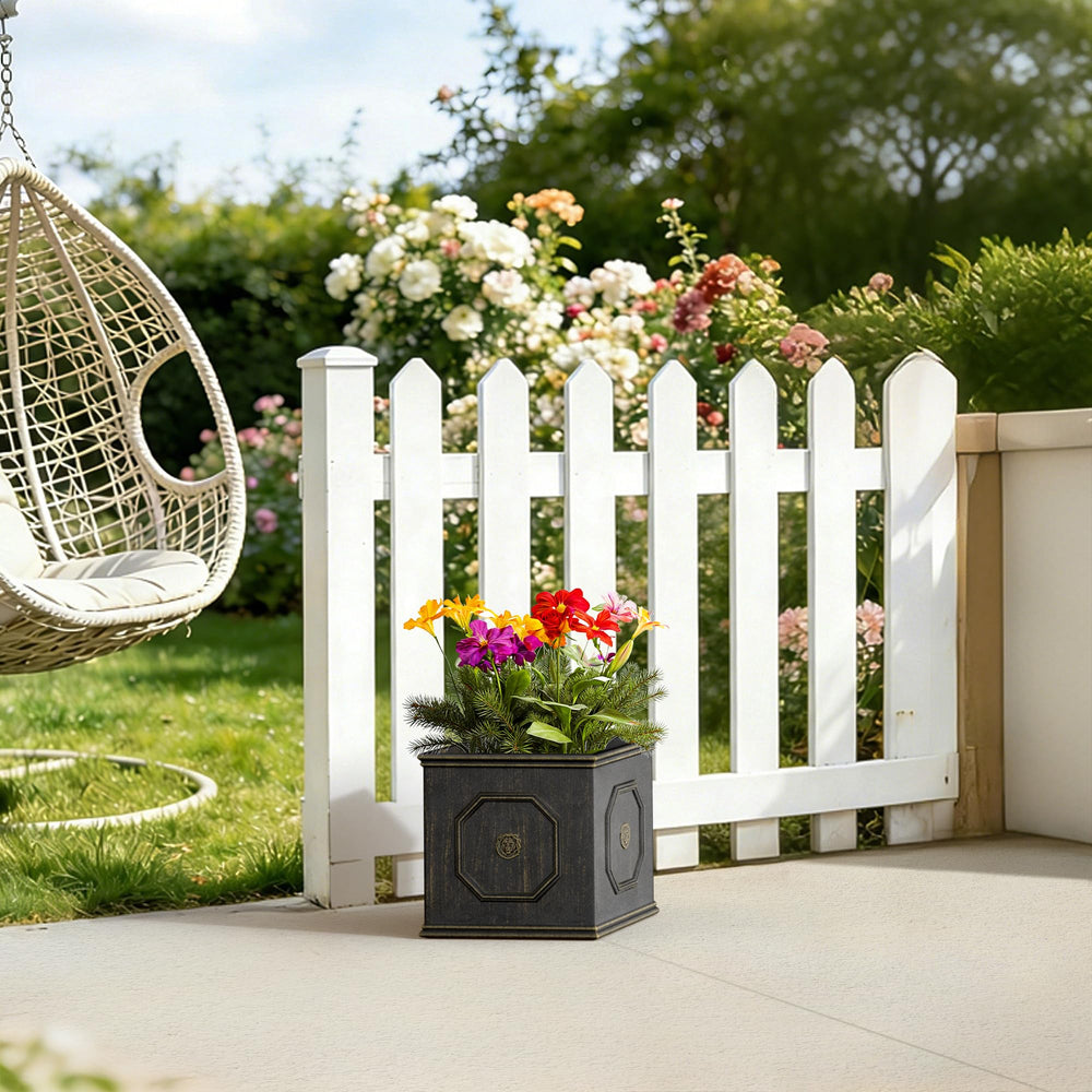 Kante planter holding a medium shrub on a porch illustrating placement ideas