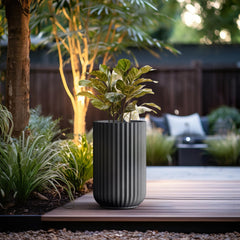 Kante planter staged on porch with plants for outdoor style and durability
