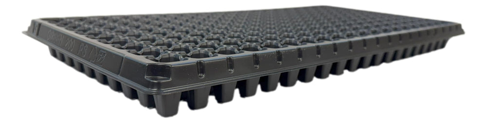 Kapok Candle Co close-up of cell walls and drainage hole demonstrating durable texture
