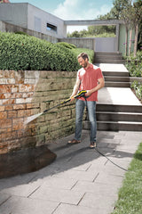 Kärcher DirtBlaster cleaning driveway showing faster grime removal benefit