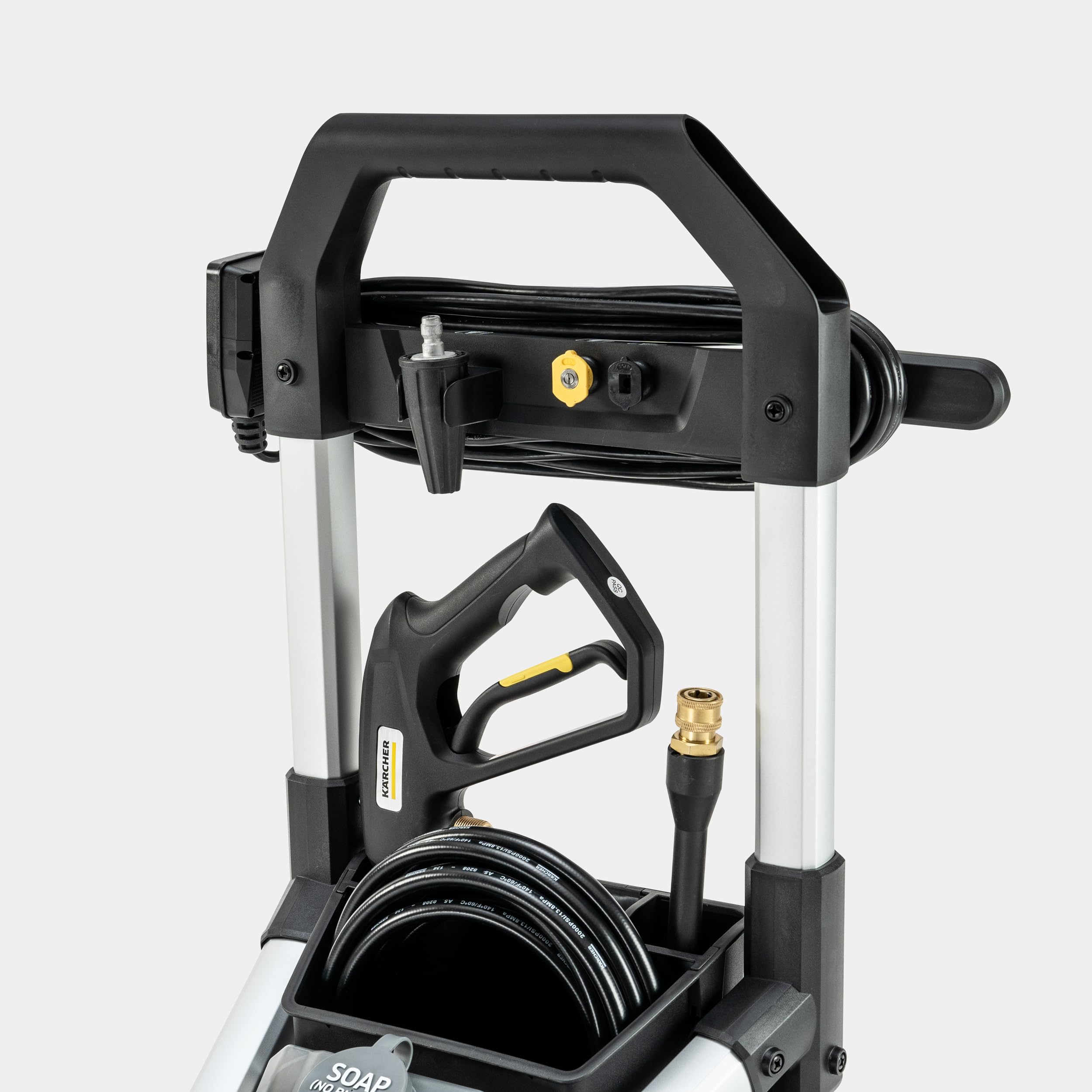 Kärcher K1700B next to a door for scale showing compact homeowner-friendly size