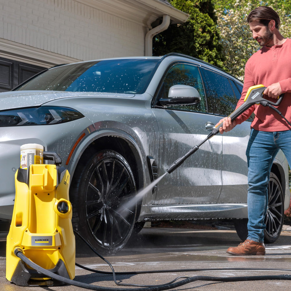 Kärcher 26 ft high-pressure hose extended to show reach and flexibility