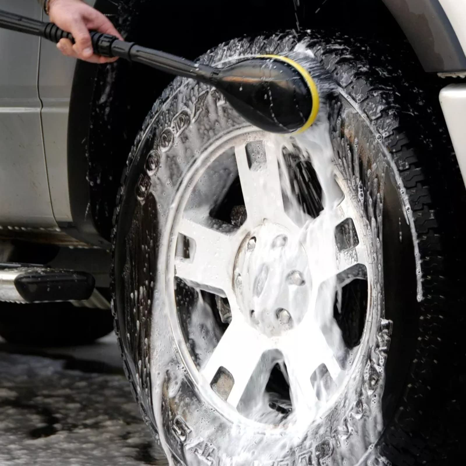 Kärcher rotating wash brush attached to wand cleaning car, saves time and reduces scrubbing