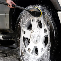 Kärcher rotating wash brush attached to wand cleaning car, saves time and reduces scrubbing