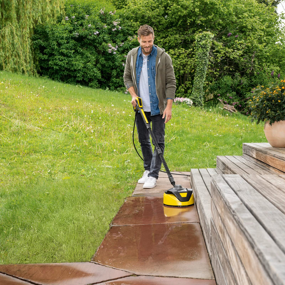 KÄRCHER T‑Racer cleaning patio surface demonstrating broad area coverage