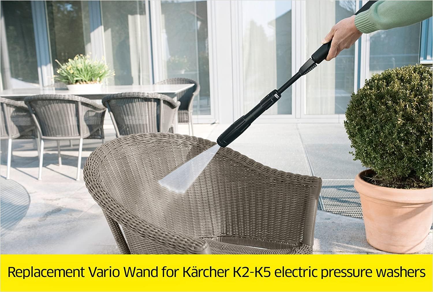 Kärcher wand in use on driveway demonstrating adjustable pressure saves time