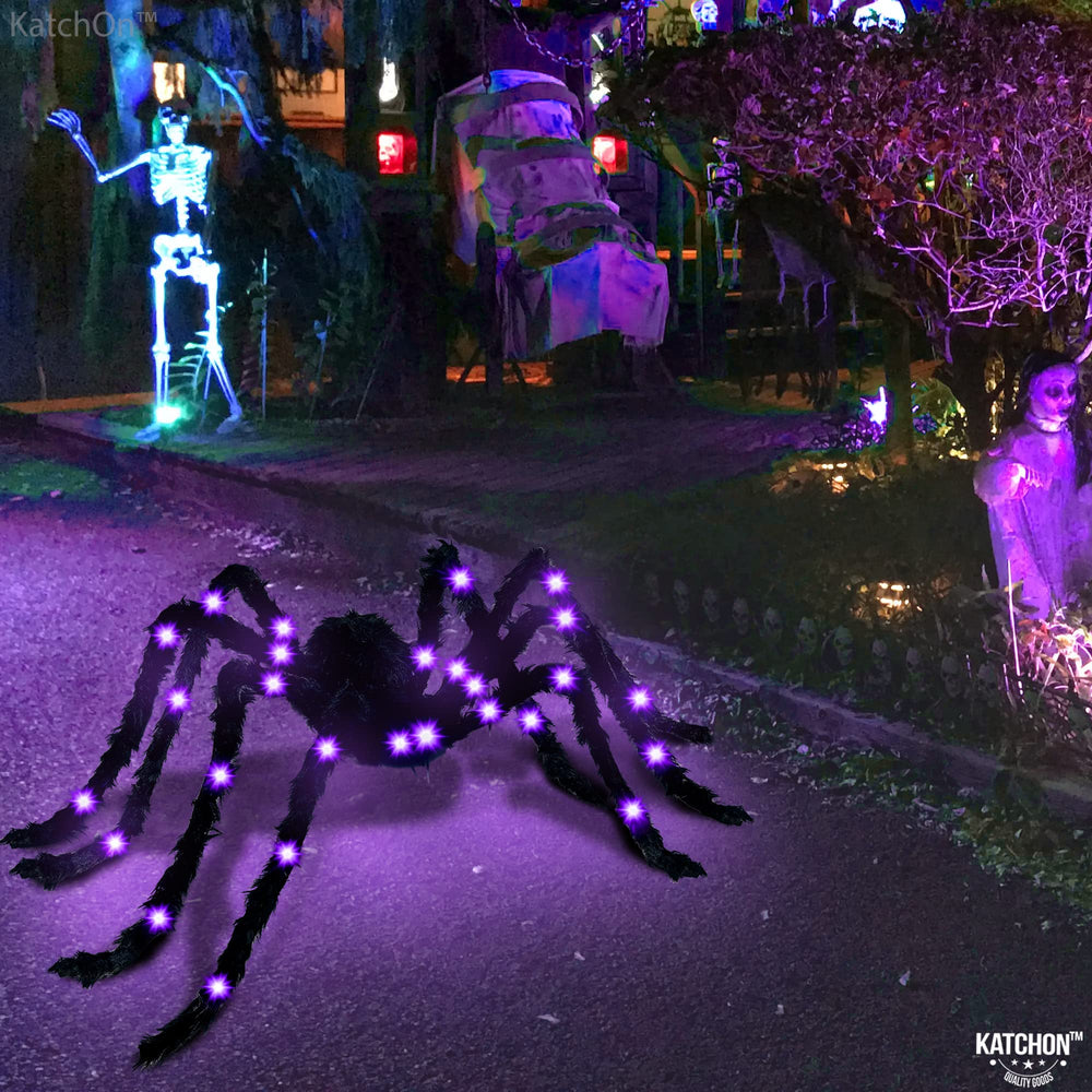 KatchOn spider beside chair to show 4ft size and visual scale