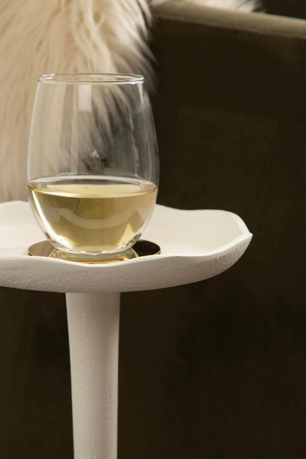 Kate and Laurel Alessia next to an armchair to show height and scale, fits small seating areas