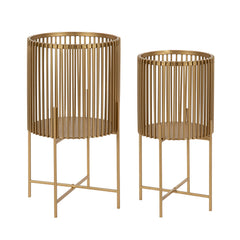 Kate and Laurel Paynter front view showing gold planters and stands lifting plants