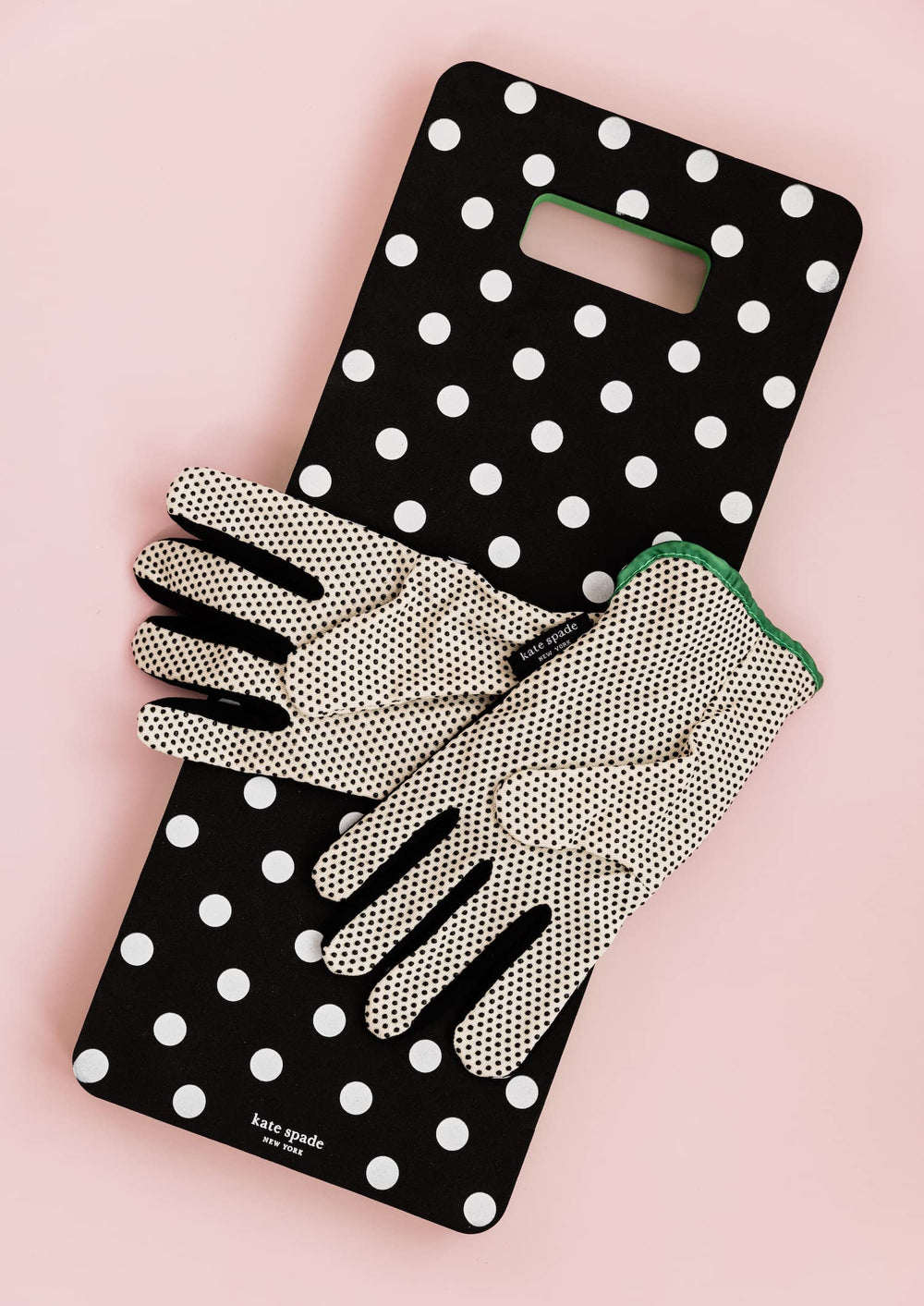 kate spade new york kneeler handle closeup reveals easy carry convenience