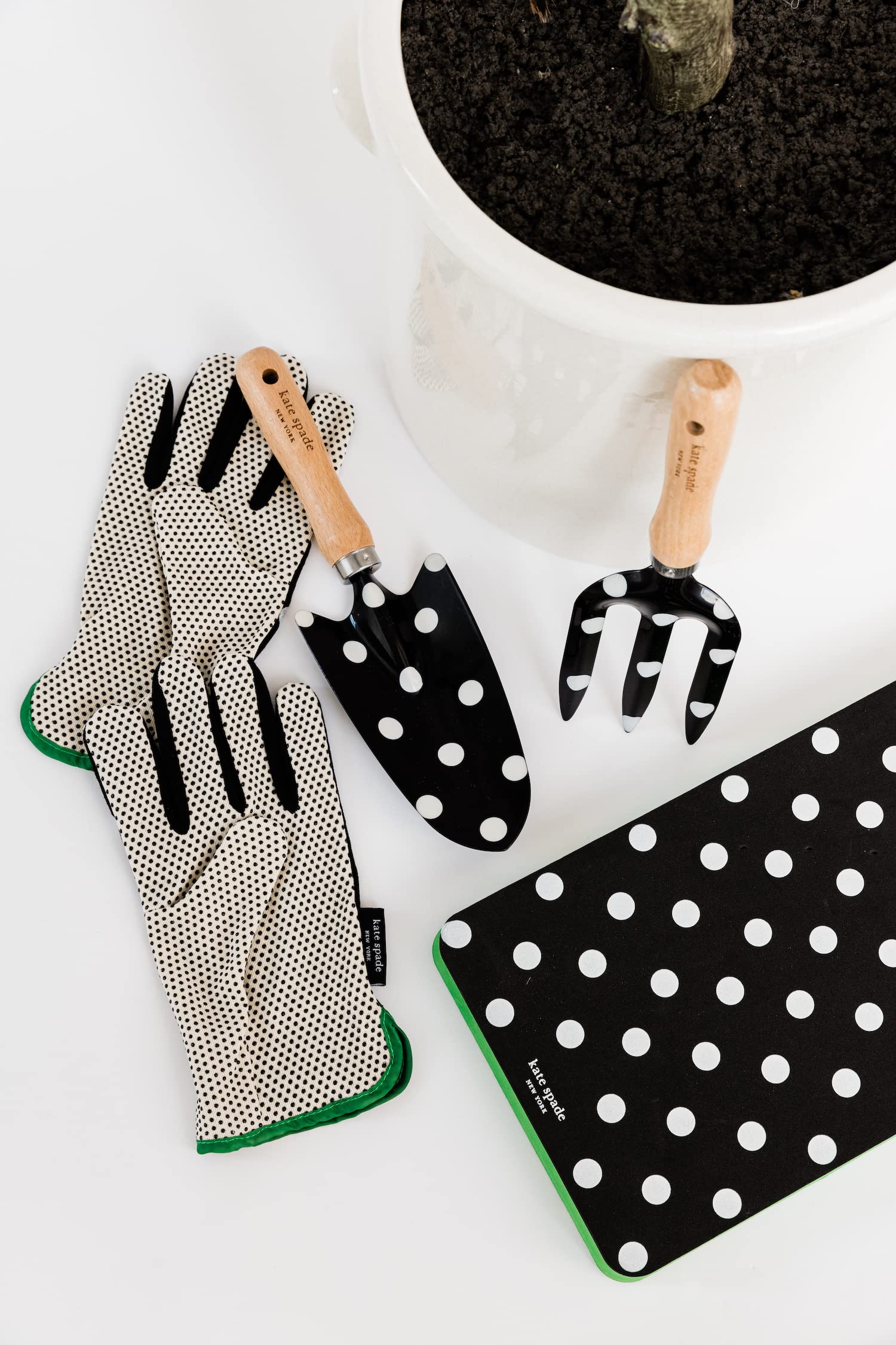kate spade new york tools hanging on pegboard for neat storage and quick access