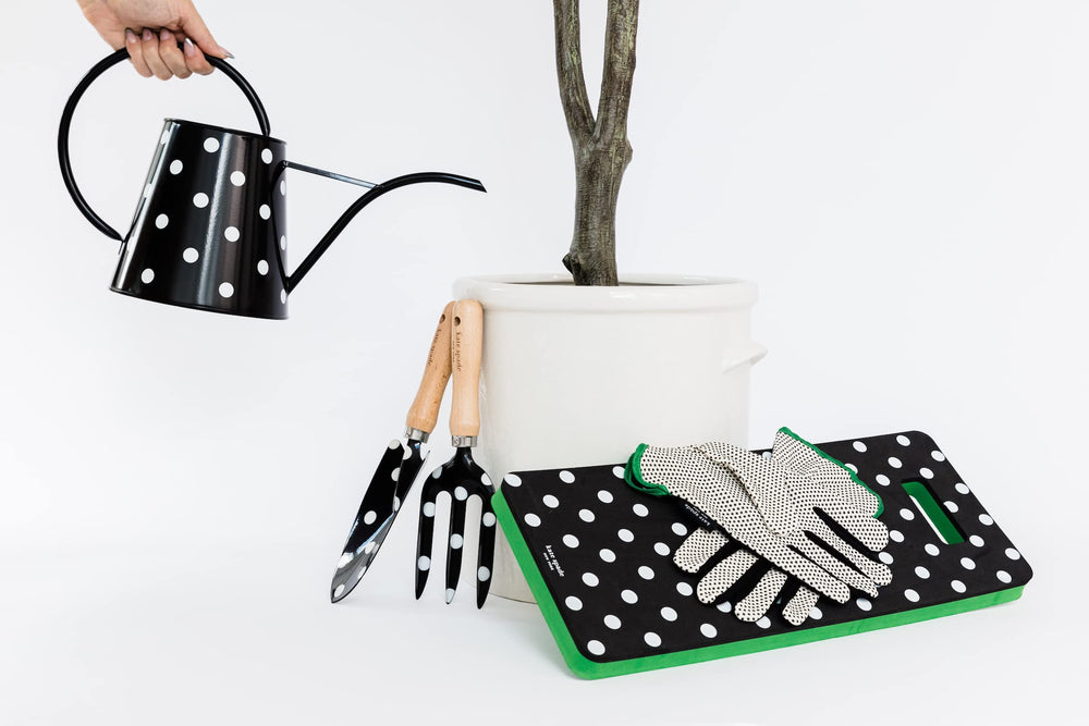 kate spade new york watering can in use pouring water to demonstrate controlled flow