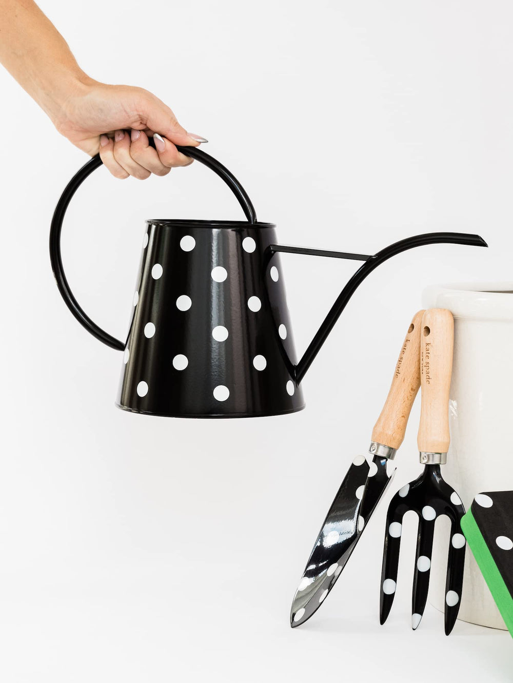 kate spade new york wide top opening shown being filled for fast, easy refills
