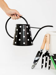 kate spade new york wide top opening shown being filled for fast, easy refills