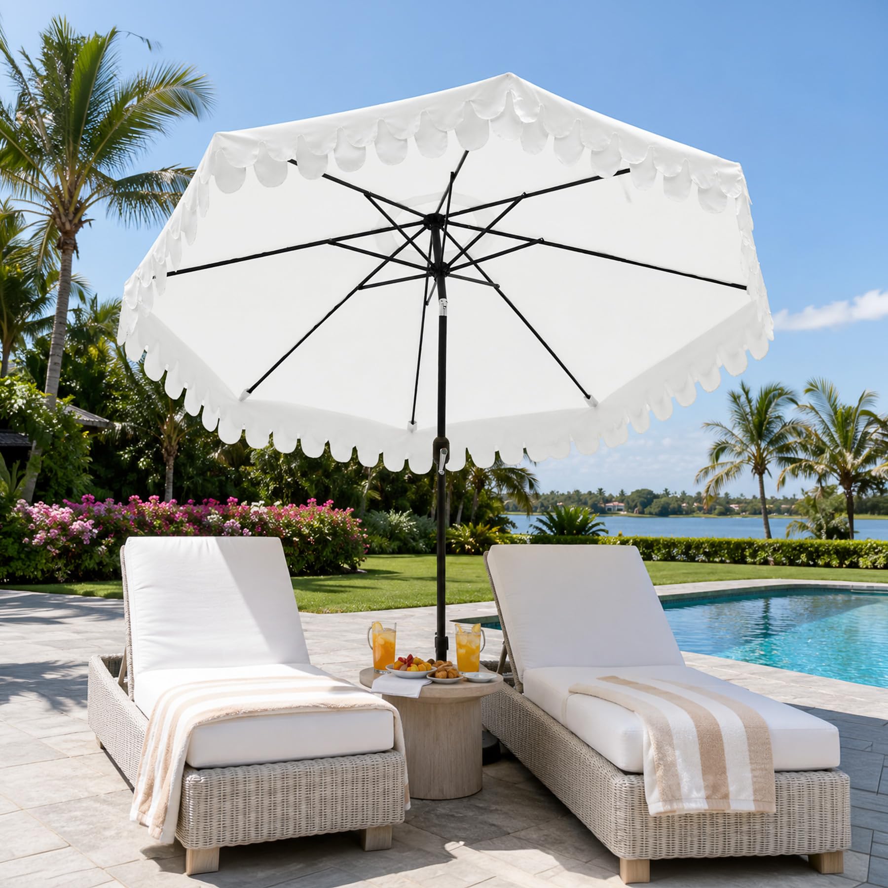 Kbrellaoutlets lifestyle scene by pool showing decorative umbrella enhancing outdoor area