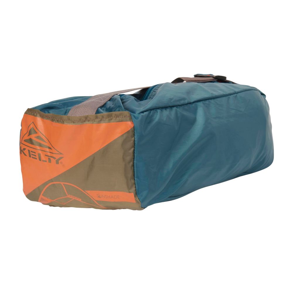 Kelty Sunshade with person standing to show 87-inch peak height and headroom benefit