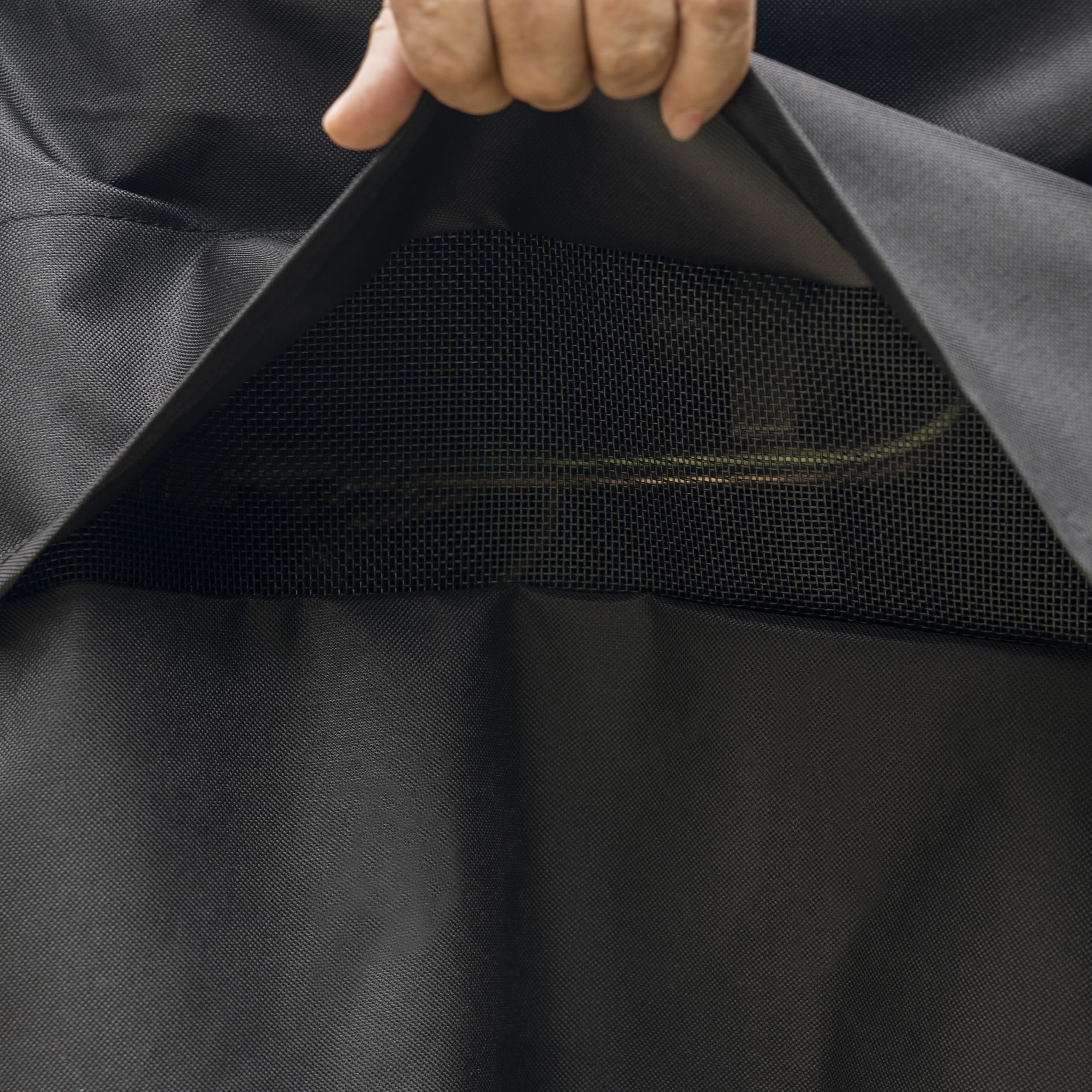 Kenmore close-up of waterproof polyester fabric showing tear resistance