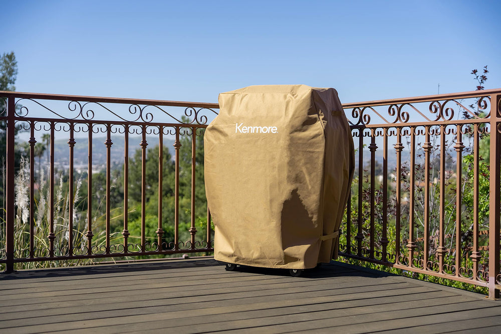 Kenmore cover on grill in backyard setting preserving grill finish and appearance