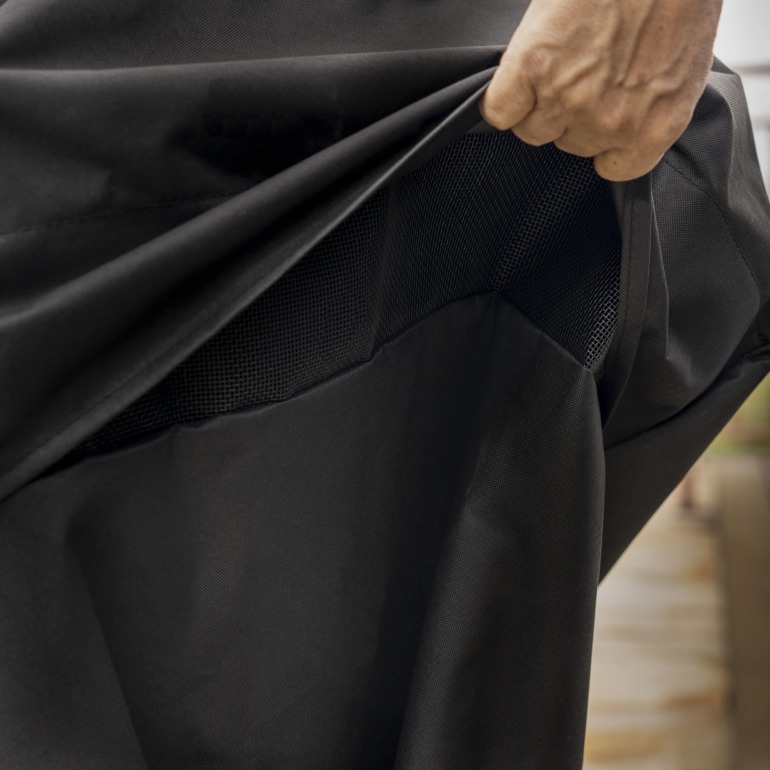 Kenmore hook-and-loop straps securing the cover tightly in wind