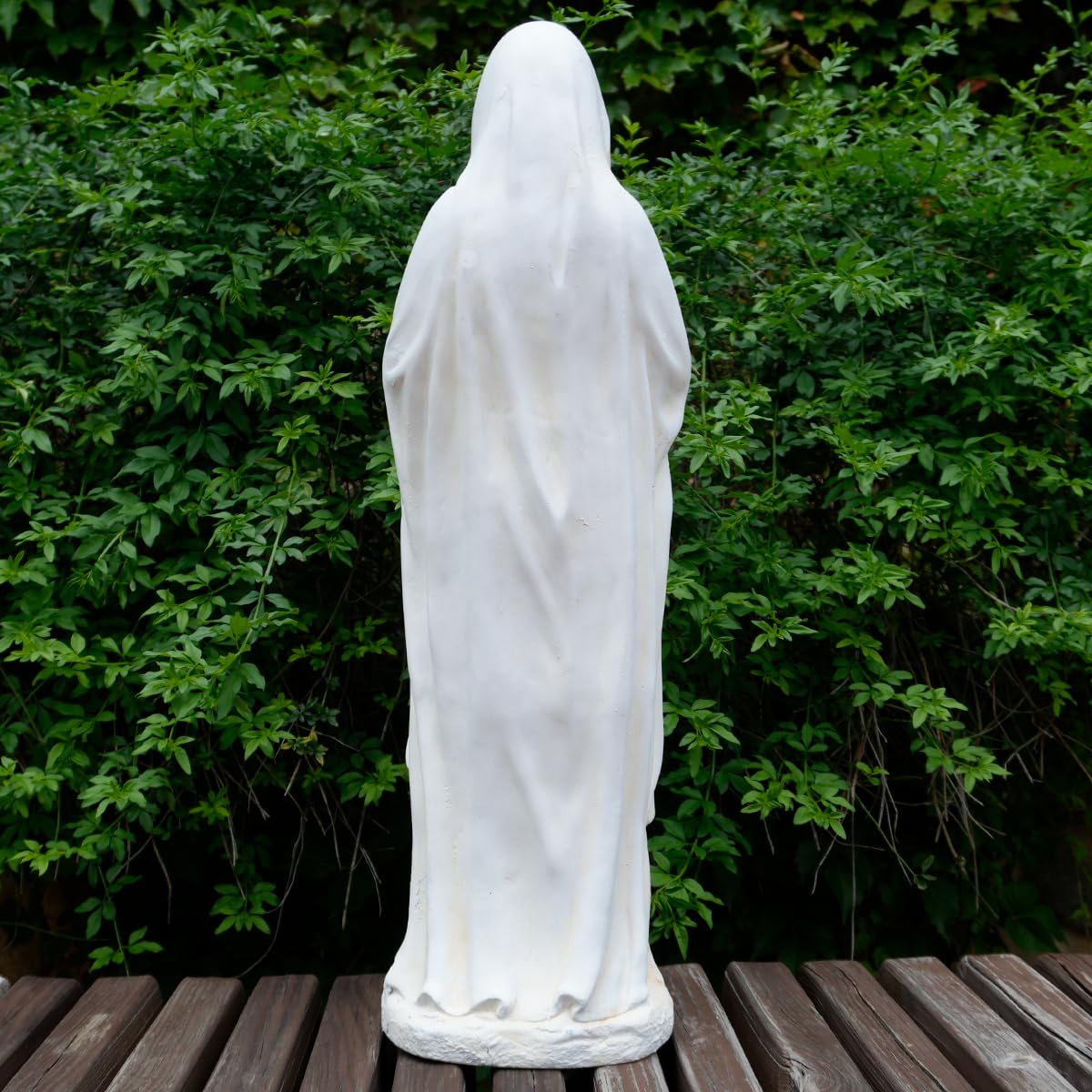 Keslecy Virgin Mary close-up of face capturing peaceful devotional expression