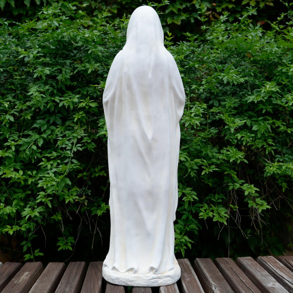 Keslecy Virgin Mary close-up of face capturing peaceful devotional expression