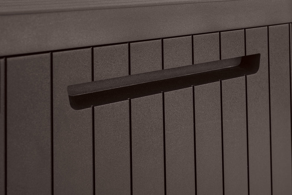 Keter City next to chair for scale showing compact dimensions suitable for small patios