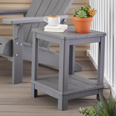 Keter side table on deck between chairs demonstrating convenient placement