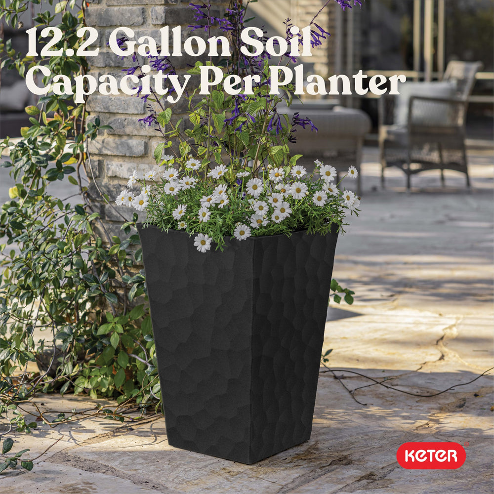 Keter planter staged with flowering shrubs to show planting depth and visual impact